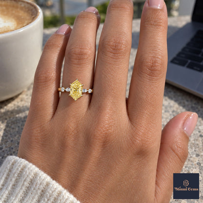 Yellow Hexagon Cut Lab Grown Diamond Engagement Ring - Marquise and Round Accents in yellow gold, on the hand