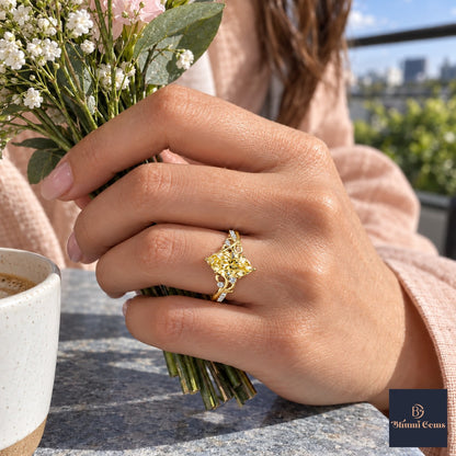 Yellow Marquise Cut Lab Grown Diamond Engagement Ring - Vintage Scroll in yellow gold, worn on the hand