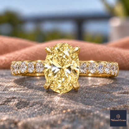 Yellow Oval Cut Lab Grown Diamond Engagement Ring - Cathedral Pave Band in yellow gold, close-up