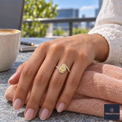 Yellow Oval Cut Lab Grown Diamond Engagement Ring - Halo Bypass in rose gold, on the hand