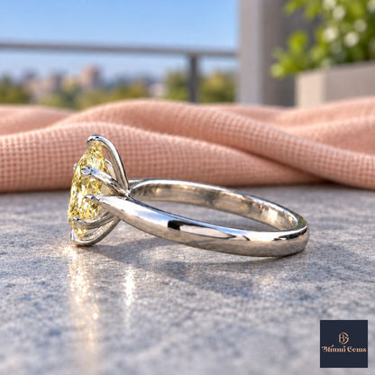Yellow Oval Cut Lab Grown Diamond Engagement Ring - Heart Prong Solitaire in white gold, side view