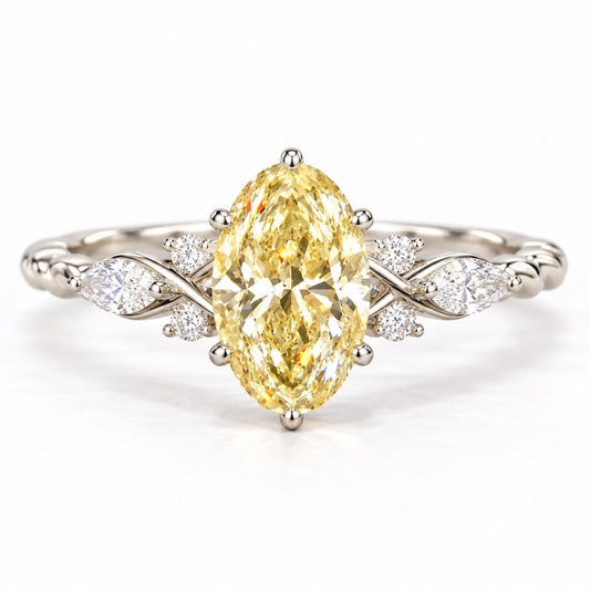 Yellow Oval Cut Lab Grown Diamond Engagement Ring - Leaf Cluster Shoulders in white gold, front view