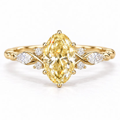 Yellow Oval Cut Lab Grown Diamond Engagement Ring - Leaf Cluster Shoulders in yellow gold, front view