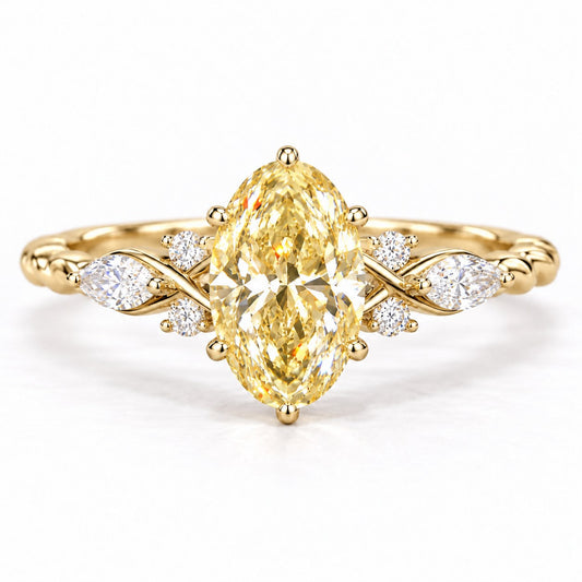 Yellow Oval Cut Lab Grown Diamond Engagement Ring - Leaf Cluster Shoulders in yellow gold, front view