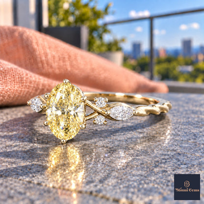Yellow Oval Cut Lab Grown Diamond Engagement Ring - Leaf Cluster Shoulders in yellow gold, side view