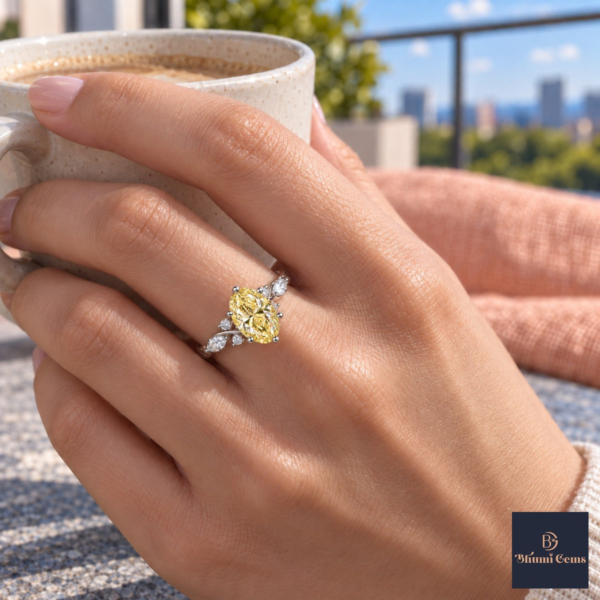 Yellow Oval Cut Lab Grown Diamond Engagement Ring - Leaf Cluster Shoulders in white gold, on the hand