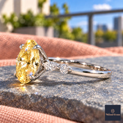 Yellow Oval Cut Lab Grown Diamond Engagement Ring - Marquise and Round Accents in white gold, side view