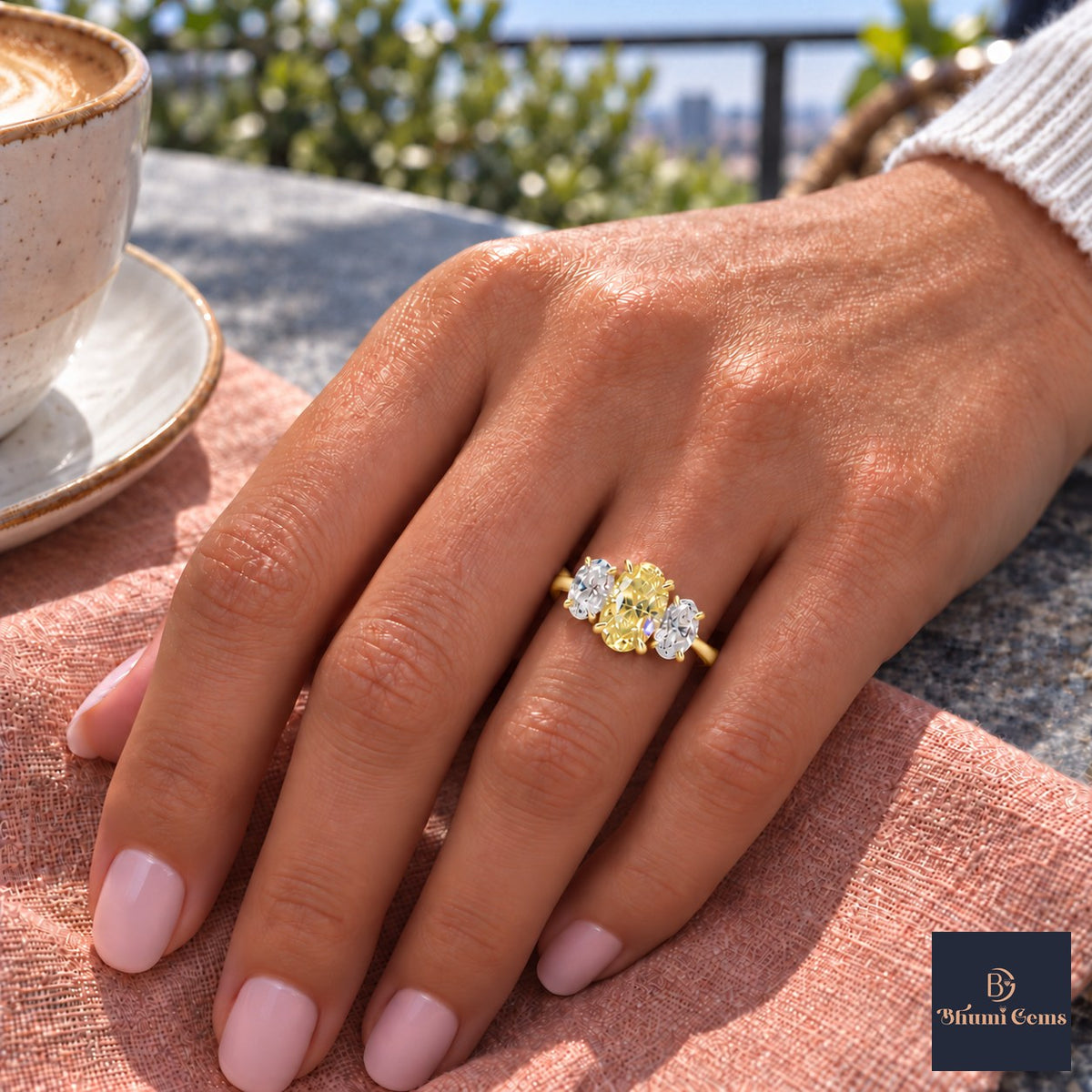 Yellow Oval Cut Lab Grown Diamond Engagement Ring - Oval Three Stone in yellow gold, on the hand