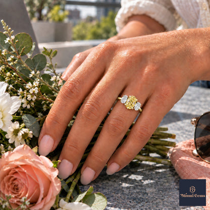 Yellow Oval Cut Lab Grown Diamond Engagement Ring - Oval Three Stone in yellow gold, worn on the hand