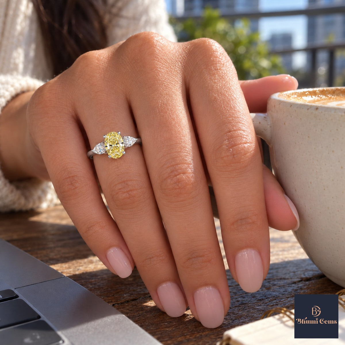 Yellow Oval Cut Lab Grown Diamond Engagement Ring - Pear Side Stones in white gold, on the hand