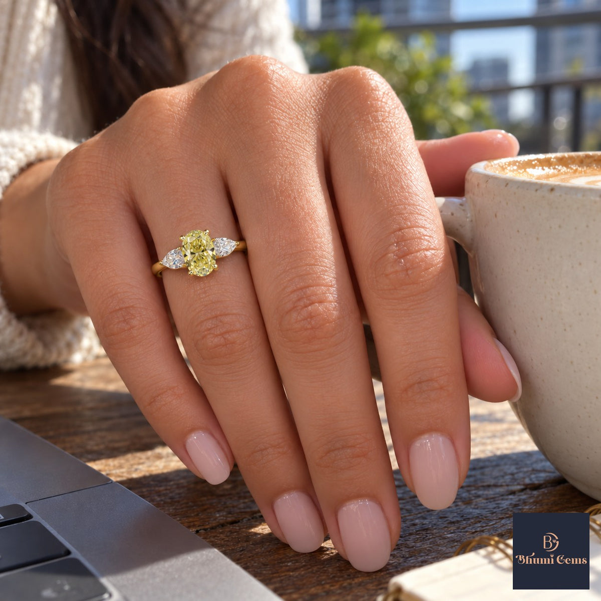 Yellow Oval Cut Lab Grown Diamond Engagement Ring - Pear Side Stones in yellow gold, on the hand