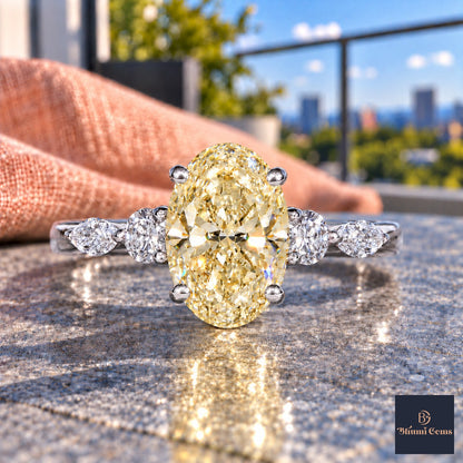 Yellow Oval Cut Lab Grown Diamond Engagement Ring - Round and Marquise Accents in white gold, close-up