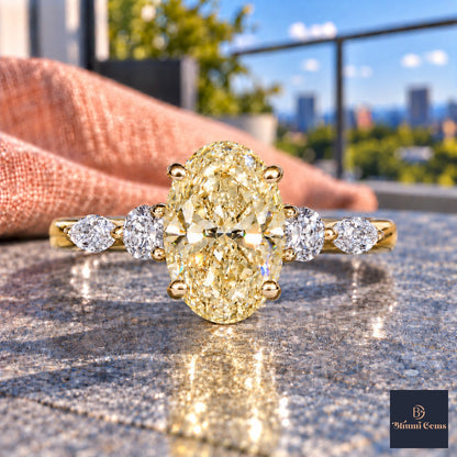 Yellow Oval Cut Lab Grown Diamond Engagement Ring - Round and Marquise Accents in yellow gold, close-up