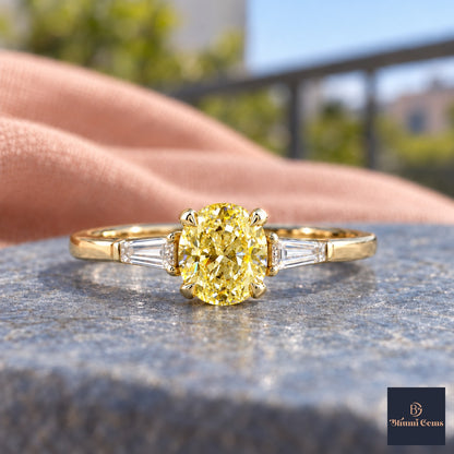 Yellow Oval Cut Lab Grown Diamond Engagement Ring - Tapered Baguettes in yellow gold, close-up
