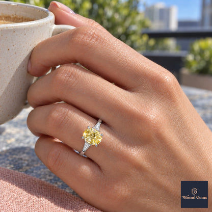 Yellow Oval Cut Lab Grown Diamond Engagement Ring - Tapered Baguettes in white gold, on the hand