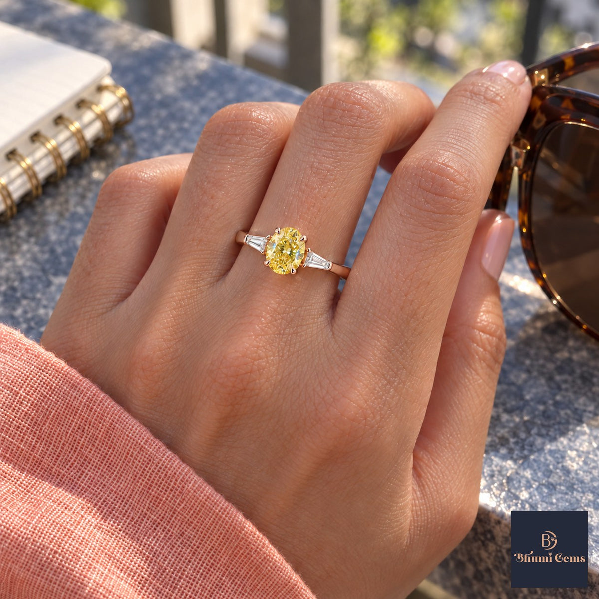 Yellow Oval Cut Lab Grown Diamond Engagement Ring - Tapered Baguettes in rose gold, worn on the hand