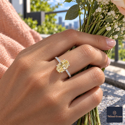 Yellow Oval Cut Lab Grown Diamond Engagement Ring - Thin Pave Band in white gold, worn on the hand