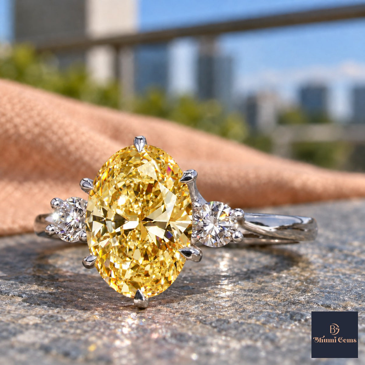 Yellow Oval Cut Lab Grown Diamond Engagement Ring - Three Stone in white gold, close-up