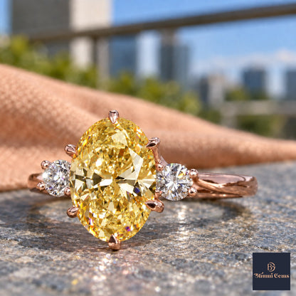 Yellow Oval Cut Lab Grown Diamond Engagement Ring - Three Stone in rose gold, close-up