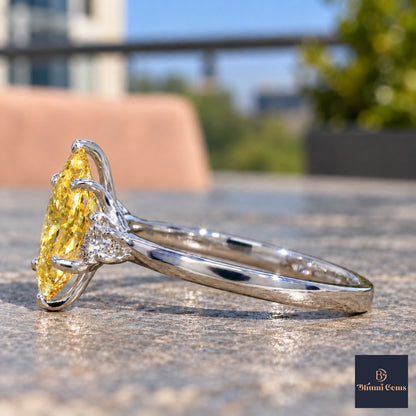Yellow Oval Cut Lab Grown Diamond Engagement Ring - Three Stone in white gold, side view