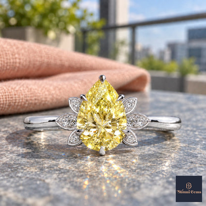 Yellow Pear Cut Lab Grown Diamond Engagement Ring - Floral Leaf Accents in white gold, close-up