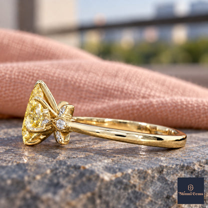 Yellow Pear Cut Lab Grown Diamond Engagement Ring - Floral Leaf Accents in yellow gold, side view