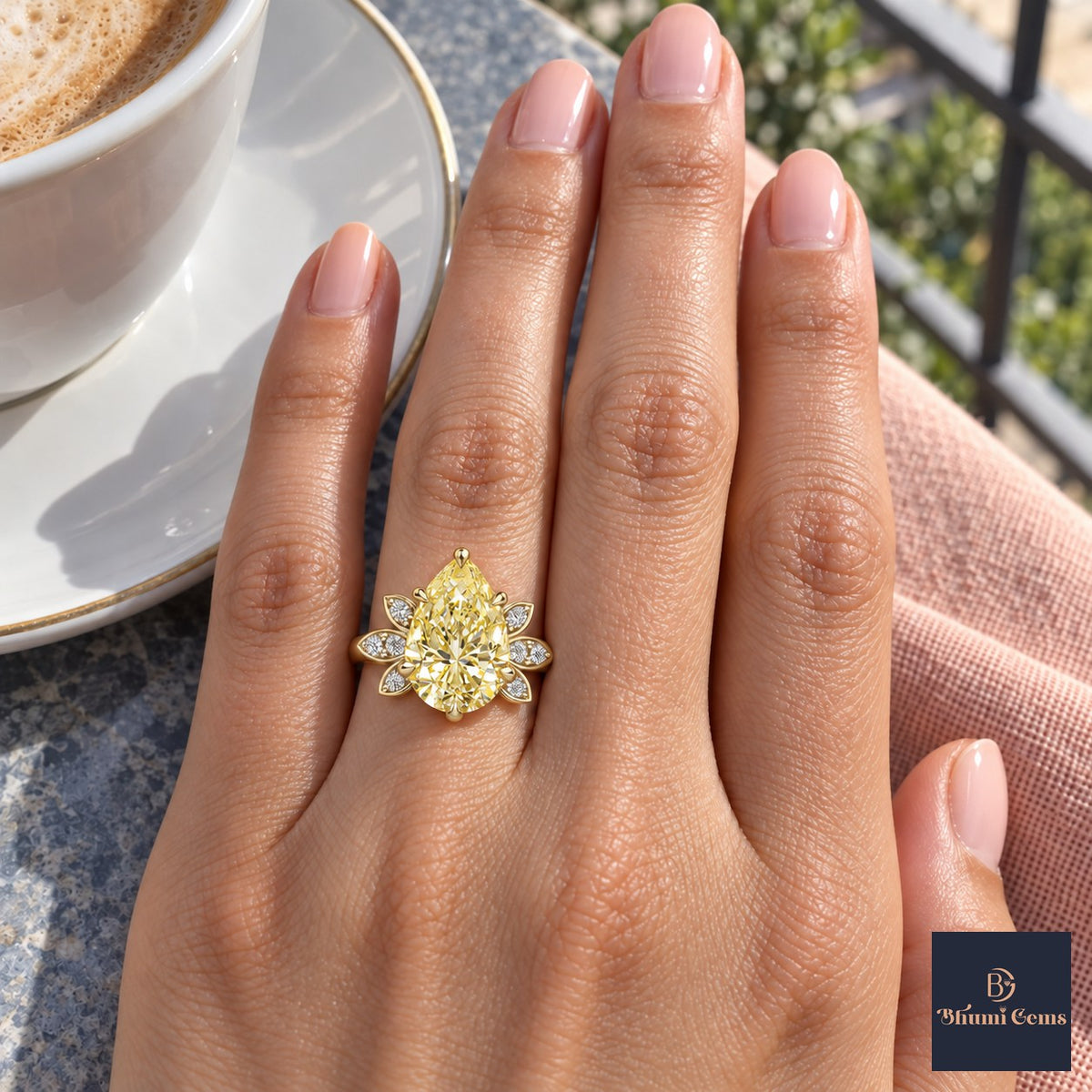 Yellow Pear Cut Lab Grown Diamond Engagement Ring - Floral Leaf Accents in yellow gold, on the hand
