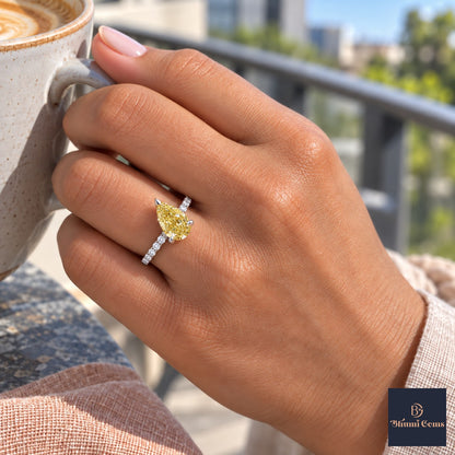 Yellow Pear Cut Lab Grown Diamond Engagement Ring - Pave Band in white gold, on the hand