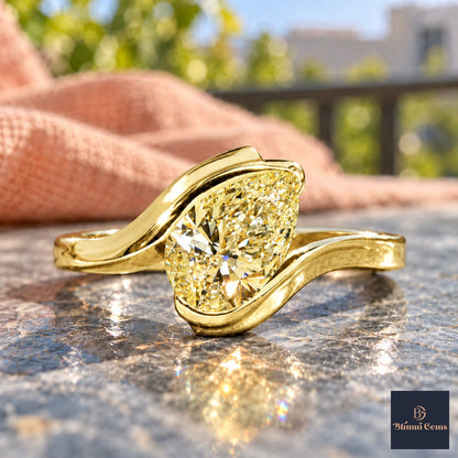 Yellow Pear Cut Lab Grown Diamond Engagement Ring - Wrap Bypass Solitaire in yellow gold, close-up