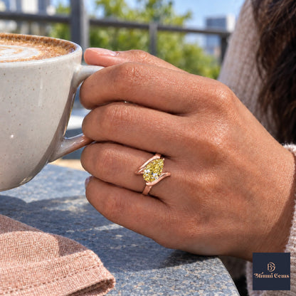 Yellow Pear Cut Lab Grown Diamond Engagement Ring - Wrap Bypass Solitaire in rose gold, on the hand