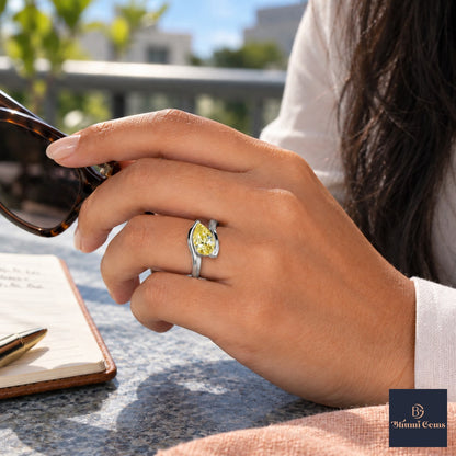 Yellow Pear Cut Lab Grown Diamond Engagement Ring - Wrap Bypass Solitaire in white gold, worn on the hand
