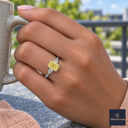 Yellow Radiant Cut Lab Grown Diamond Engagement Ring - Round Accents in white gold, on the hand