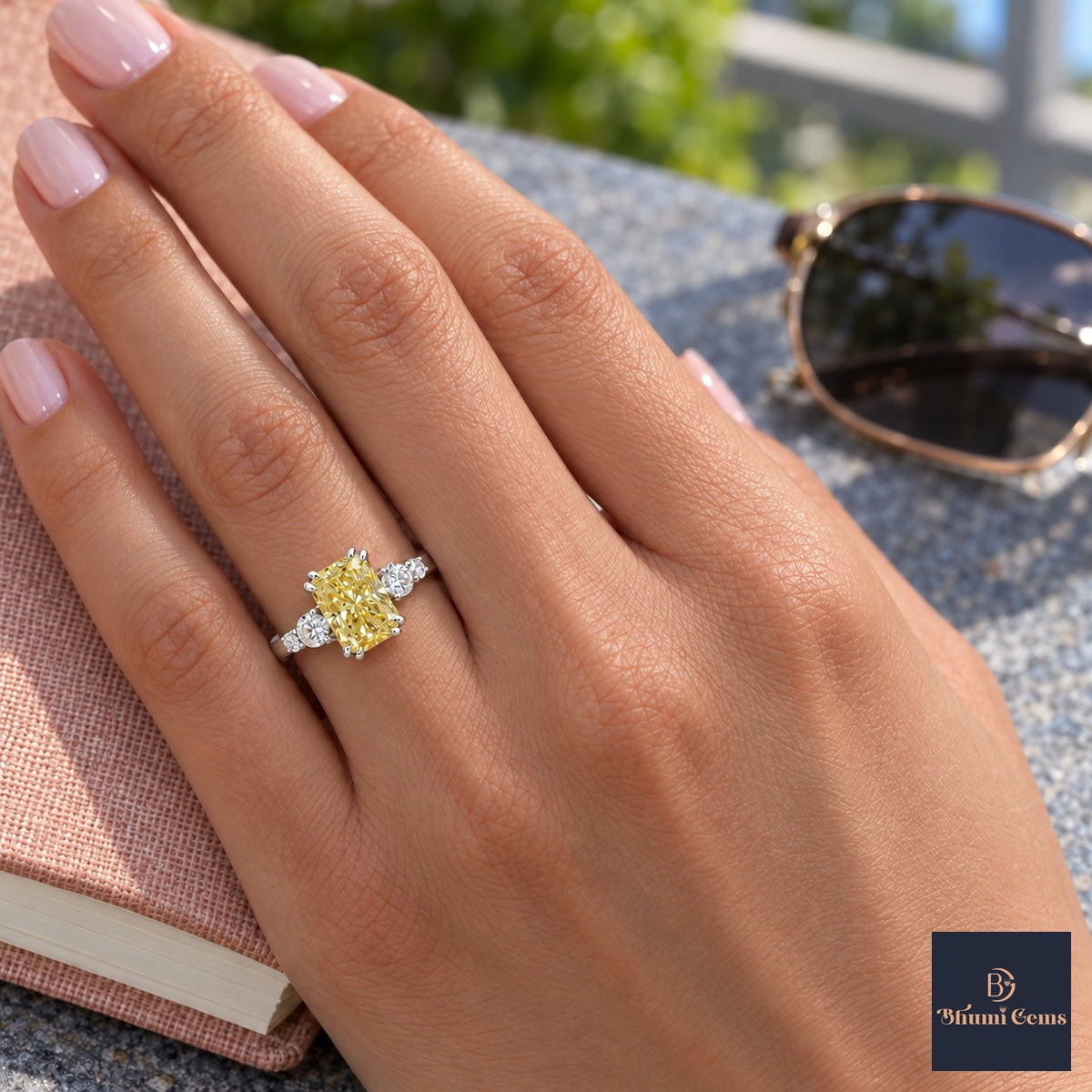 Yellow Radiant Cut Lab Grown Diamond Engagement Ring - Round Accents in white gold, worn on the hand