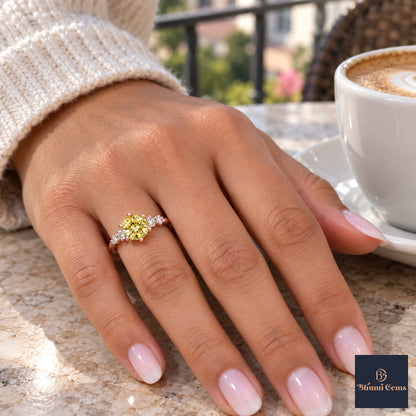 Yellow Round Cut Lab Grown Diamond Engagement Ring - Cluster Shoulders in rose gold, on the hand