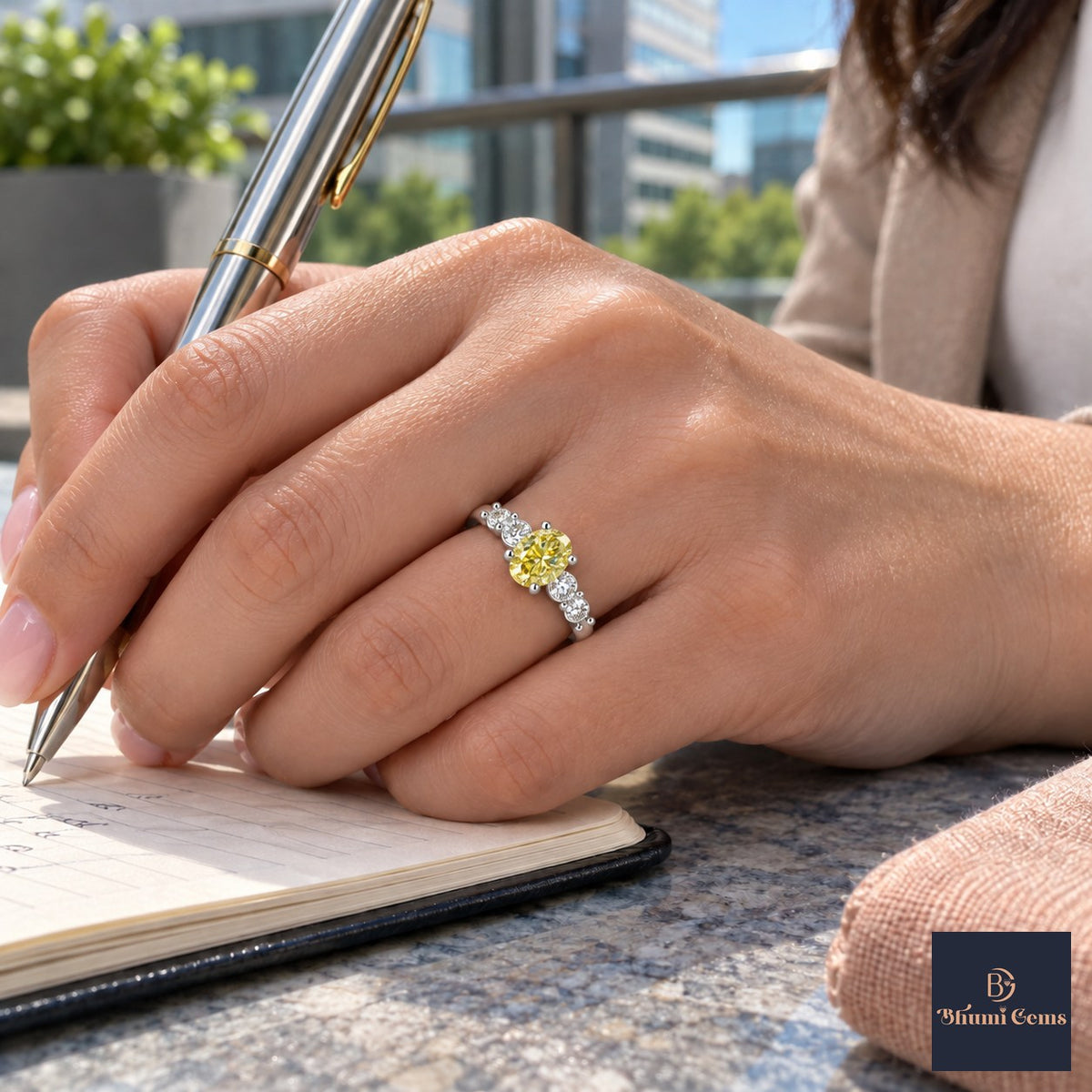 Yellow Round Cut Lab Grown Diamond Engagement Ring - Marquise and Round Station Band in white gold, on the hand